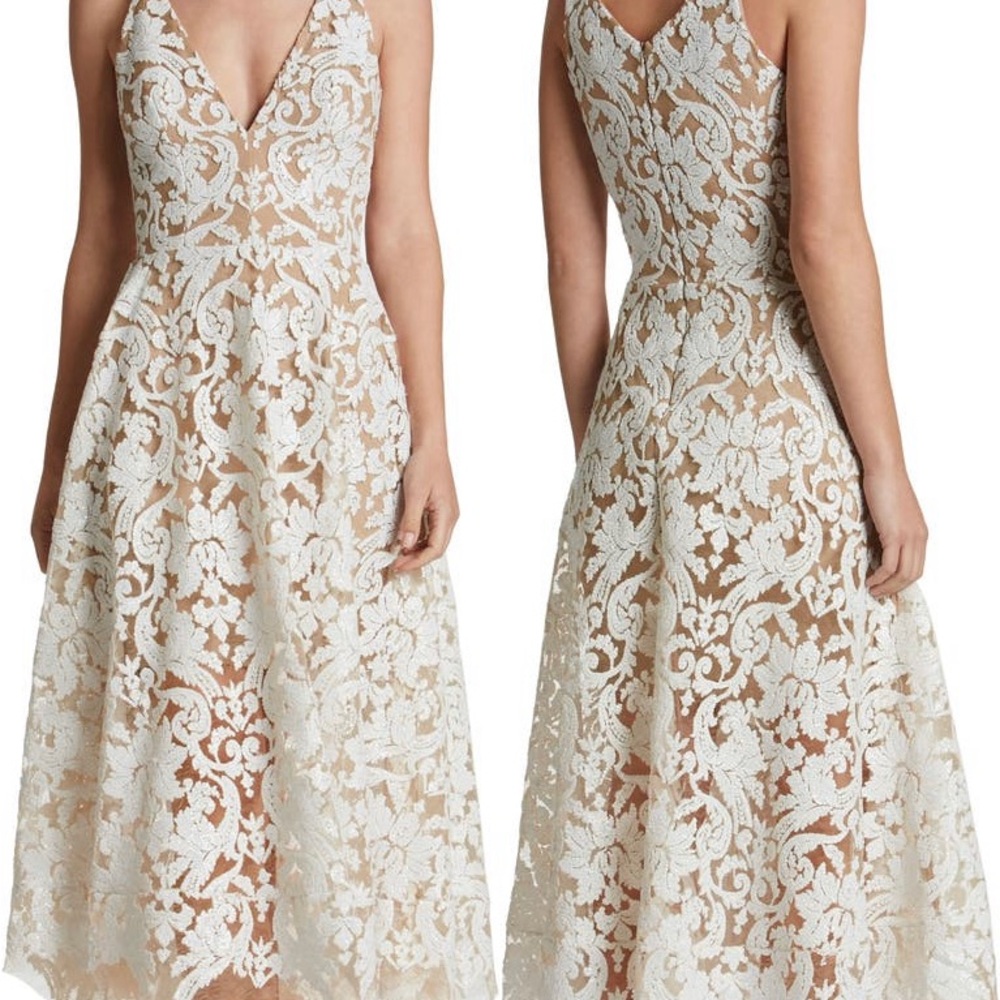 Beautiful white skin color dress. Size small. Wore it once for a baptism.